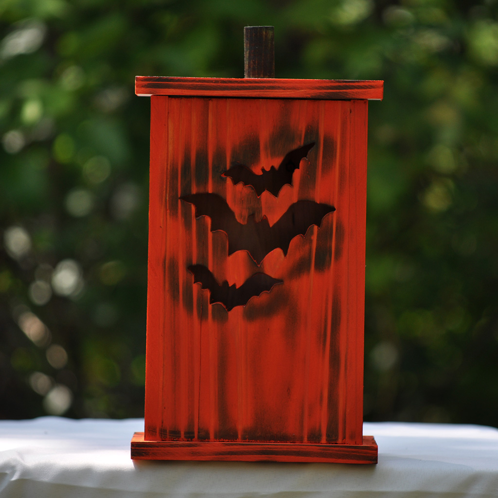 Handcrafted medium wooden birdhouse made by 12-year-old Timmy