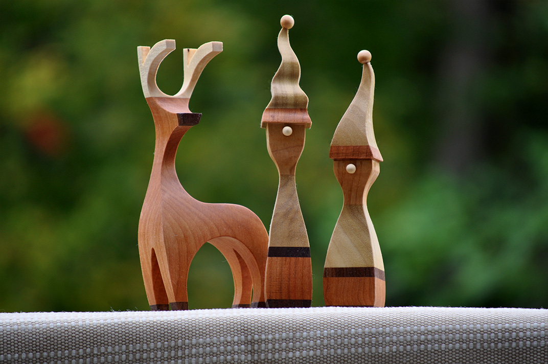 Handcrafted small wooden birdhouse made by 12-year-old Timmy