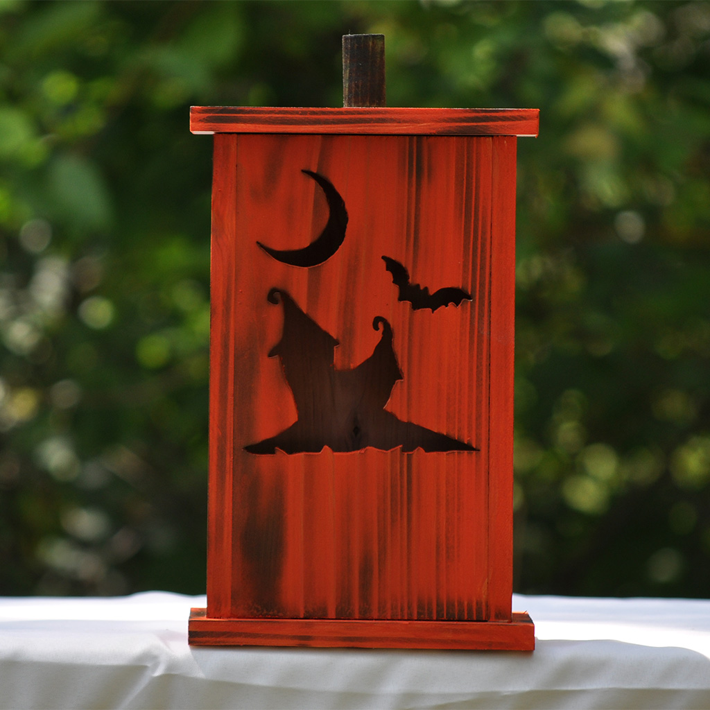 Handcrafted large wooden birdhouse made by 12-year-old Timmy