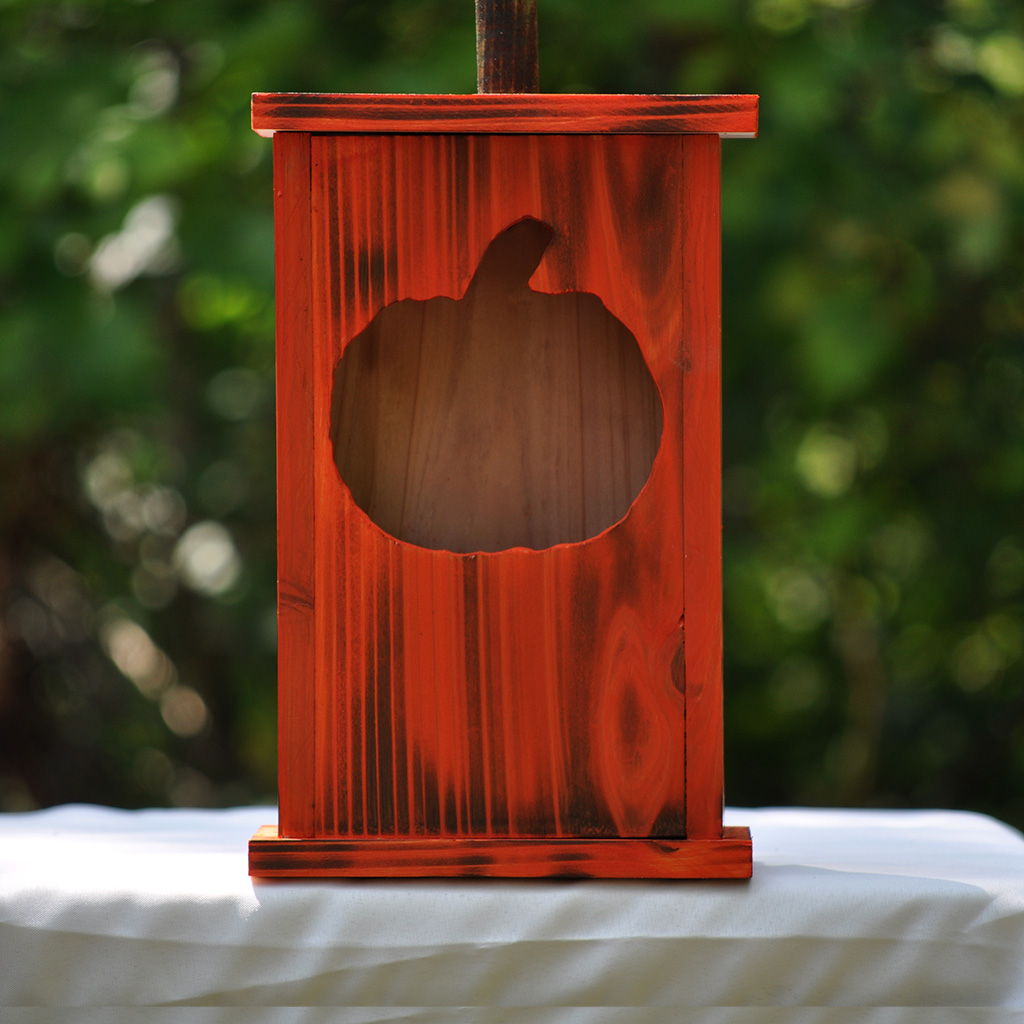 Handcrafted large wooden birdhouse made by 12-year-old Timmy